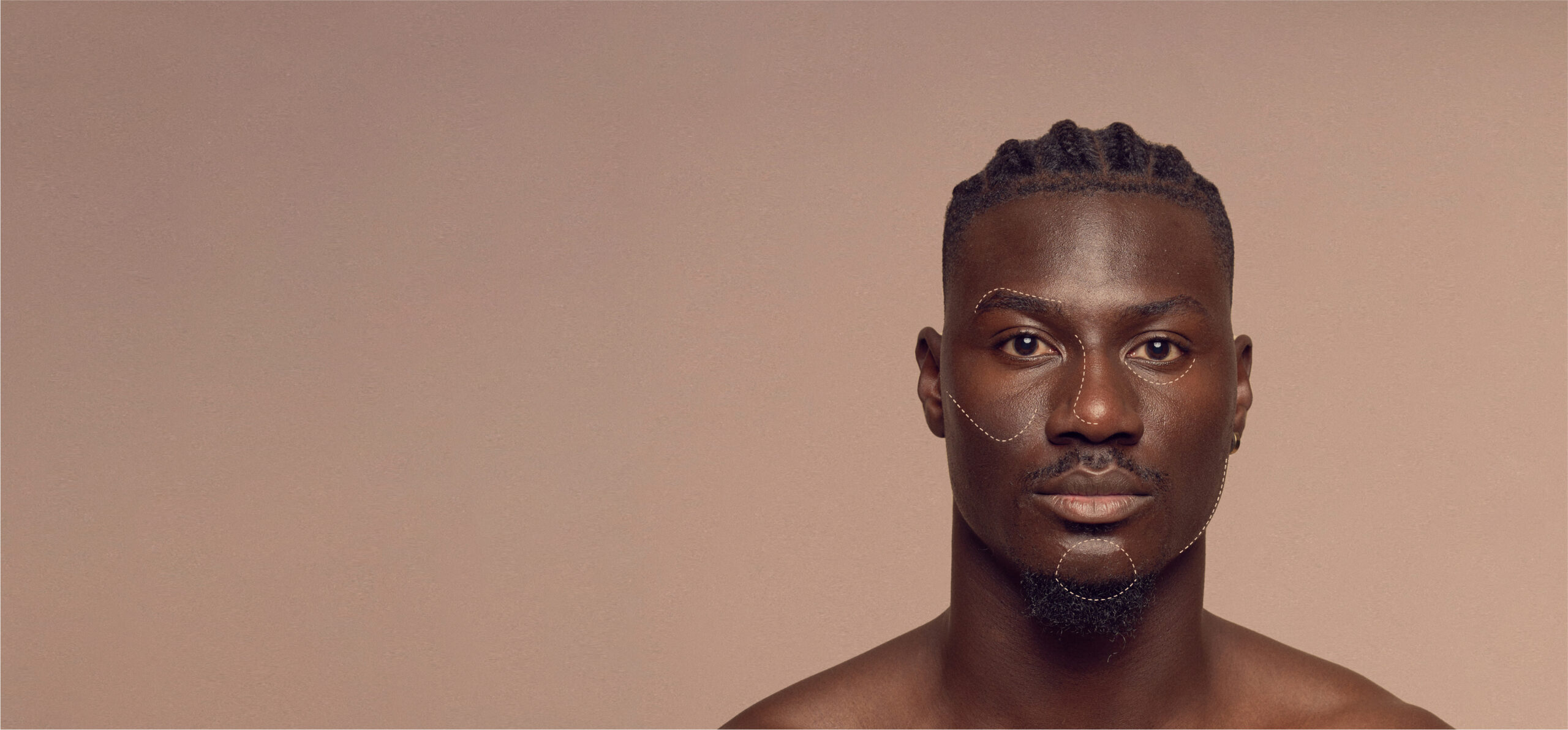 A man with textured hair styled in cornrows stares directly at the camera against a soft brown background. He has intricate line art designs on his face. The composition is minimalist, with focus on expression and detail.